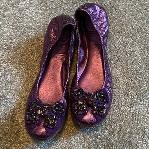 Tori Burch Purple ballet flats with purple gem embellishment on the bow.